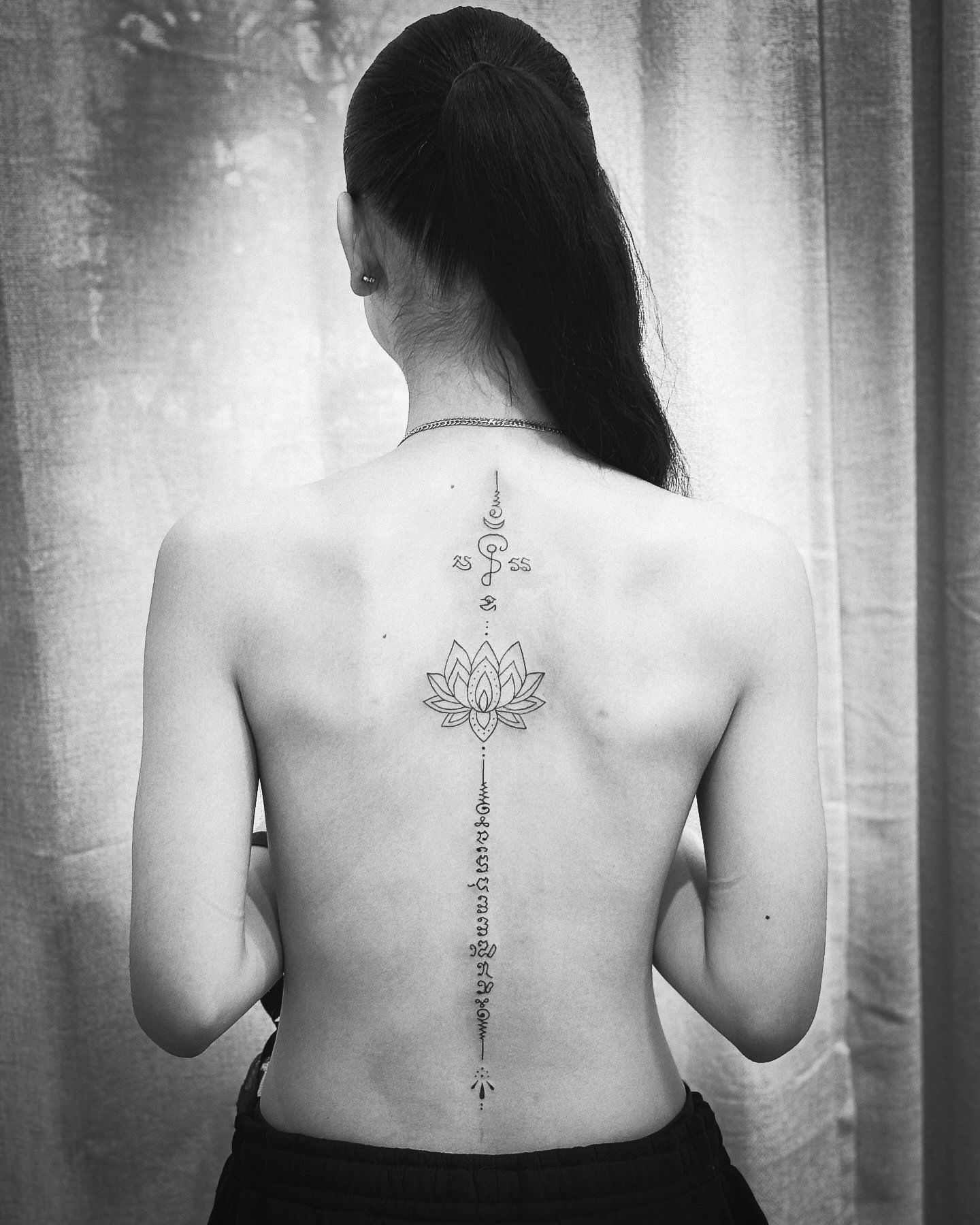 Tattoo: R%C3%BCcken WIrbels%C3%A4ule
